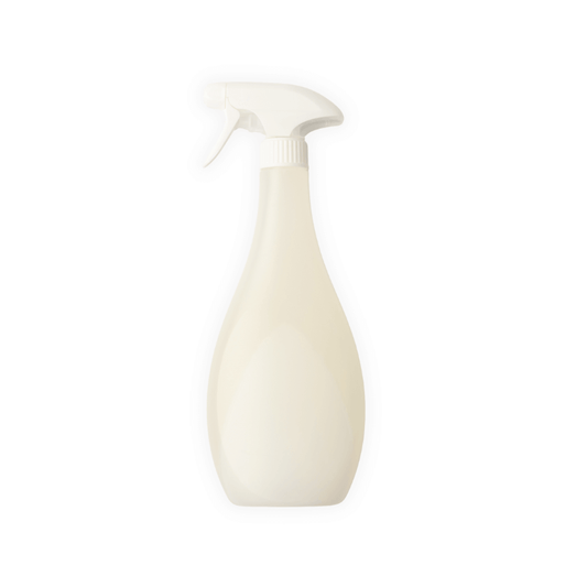 A minimalist product photo of Spray-X rust accelerator in a white spray bottle on a white background, designed for Corten steel finishing.